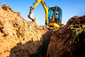 mini excavator being used on a construction project
